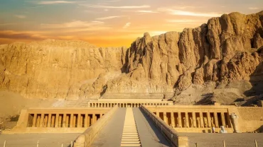 A panoramic view of Karnak Temple at sunrise. alt